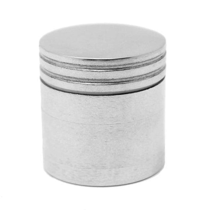 Cylindrical metal container with ridged lid, perfect for the best weed grinders