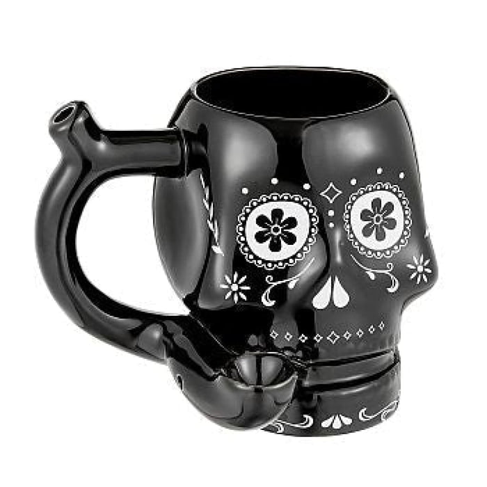 Black ceramic skull mug with white patterns, perfect for Day of the Dead celebrations