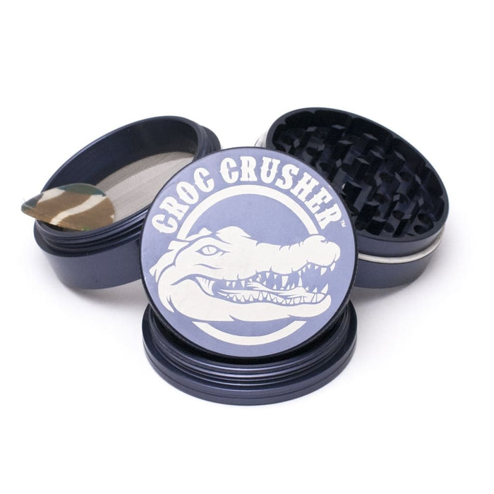 Croc Crusher Herb Grinder With Diamond Teeth And Teflon Glide Ring Featuring a Crocodile Logo