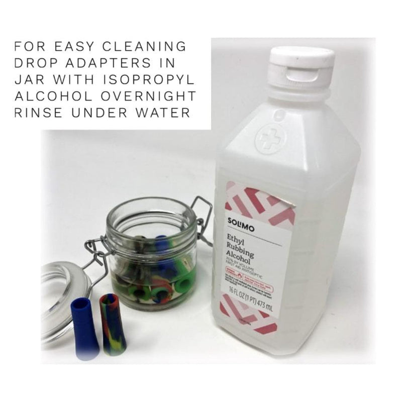 Bottle of Solimo ethyl rubbing alcohol next to jar of colorful filter weed pipe adapters