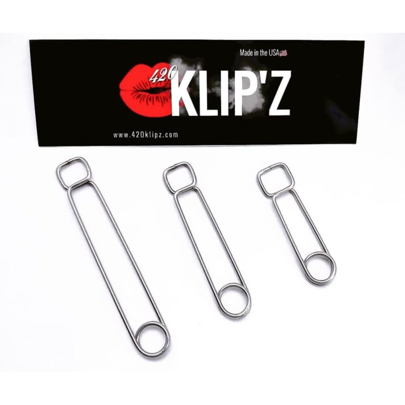Stainless steel roach clips in three sizes with brand logo